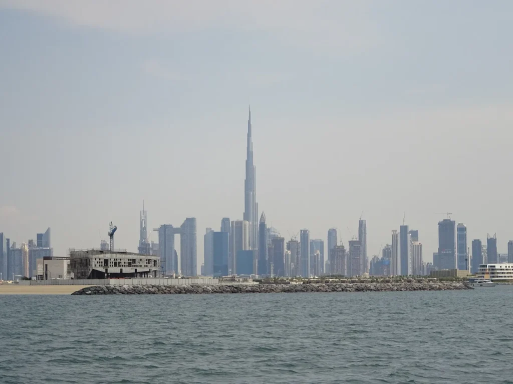 The Burj Khalifa rising above the Dubai skyline, seen from the water