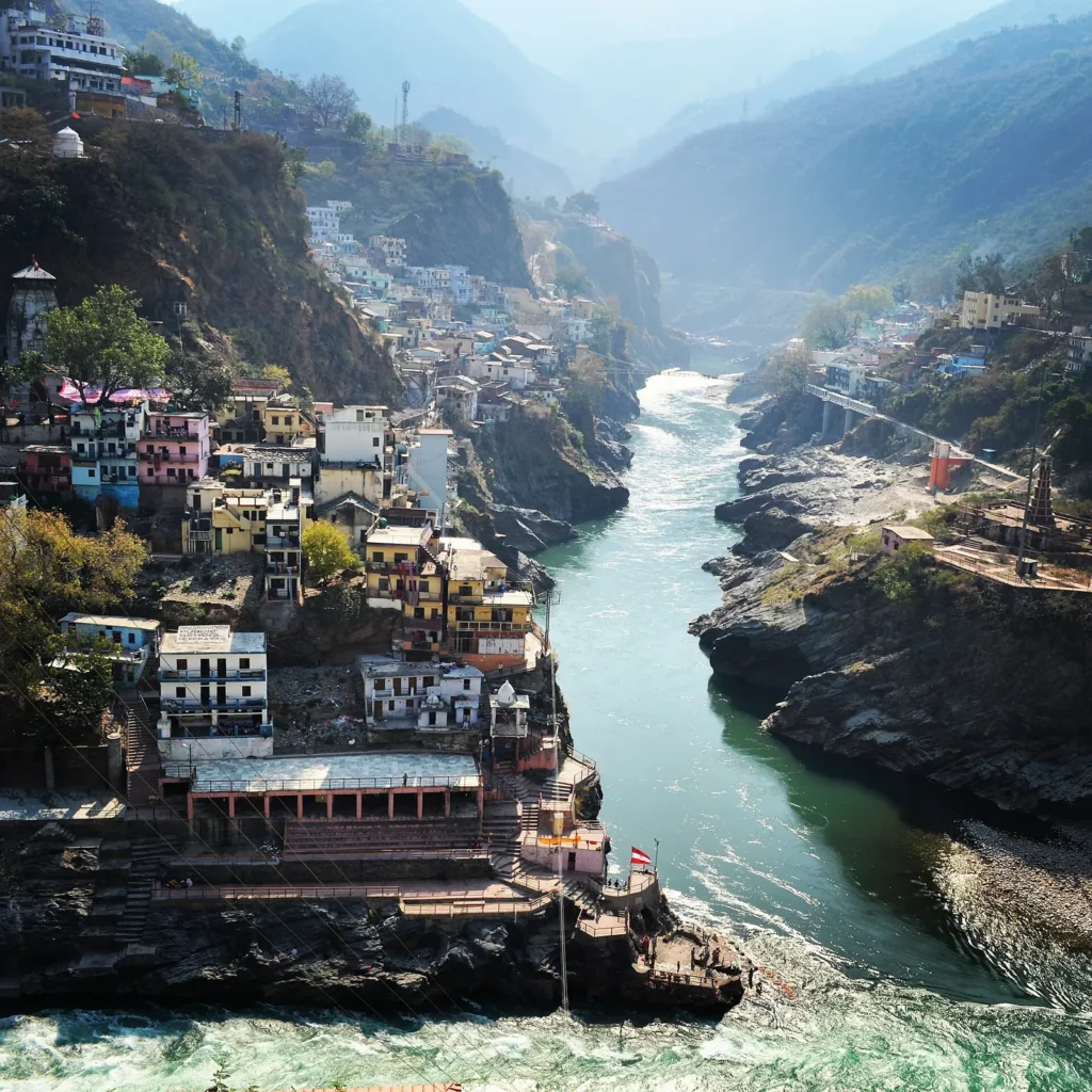 Two rivers of different colours meeting at Devprayag to form the Ganga