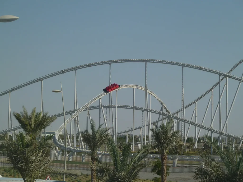 A Formula Rossa train on the coaster track outside Ferrari World