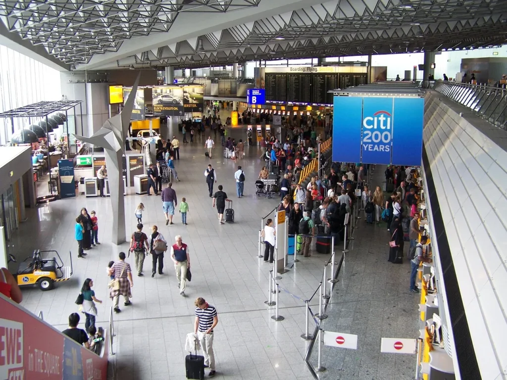 Travellers in the busy departure hall B of Frankfurt Airport Terminal 1