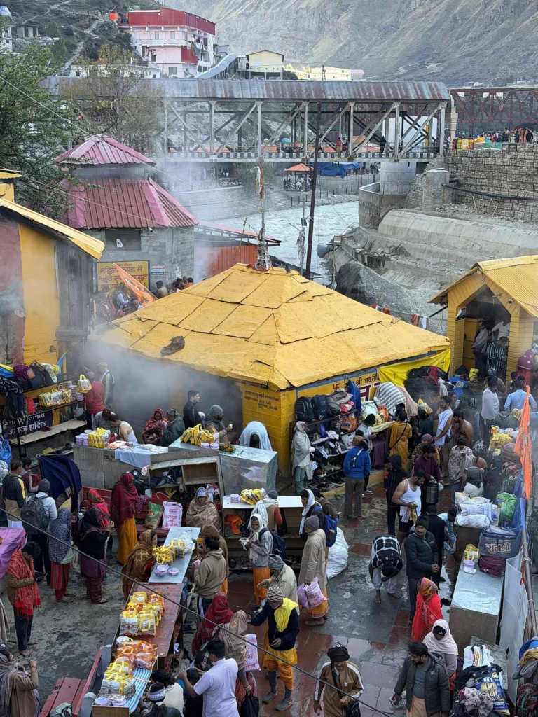 Pilgrims at the Tapt Kund hot spring pool below Badrinath temple