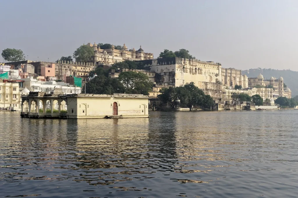 The City Palace of Udaipur rising above the shore of Lake Pichola