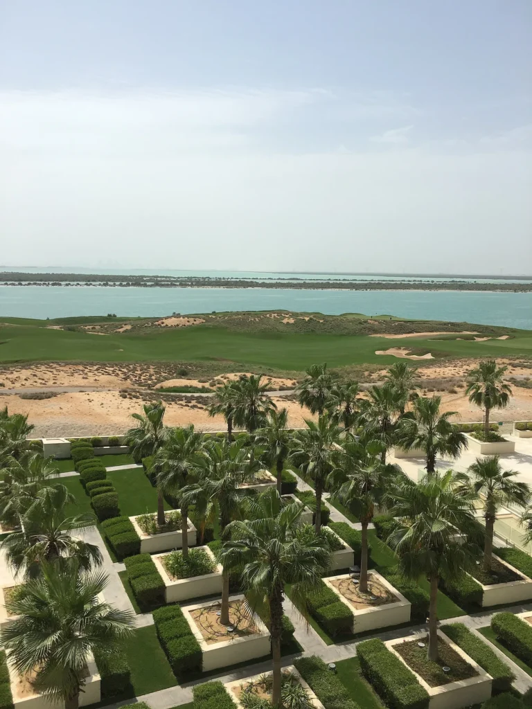 View over the low buildings and water around Yas Island