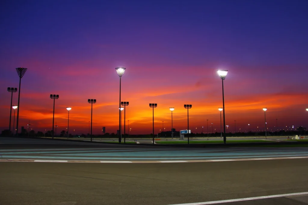 An orange sunset sky over Yas Marina Circuit